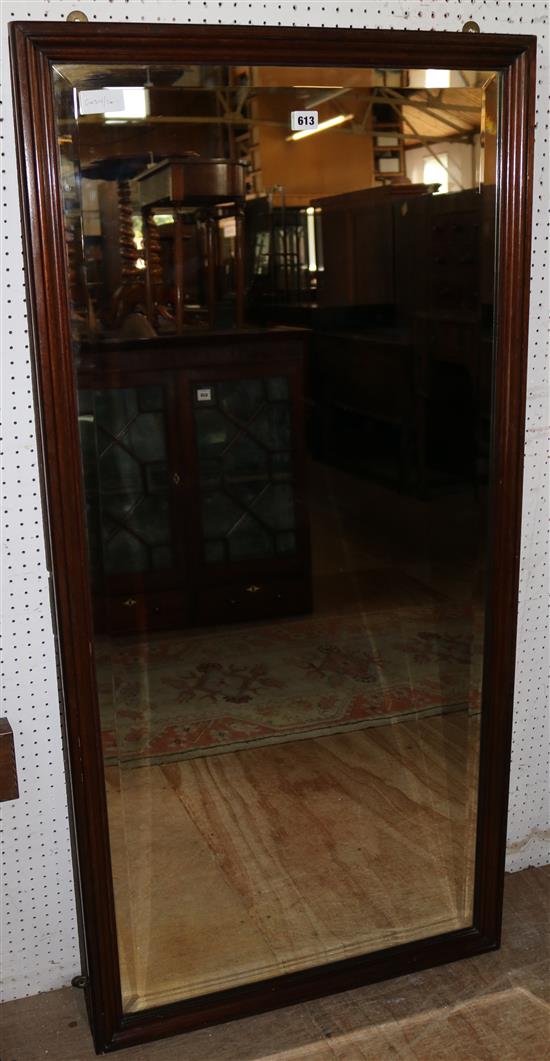 Bevelled mirror in a wooden frame